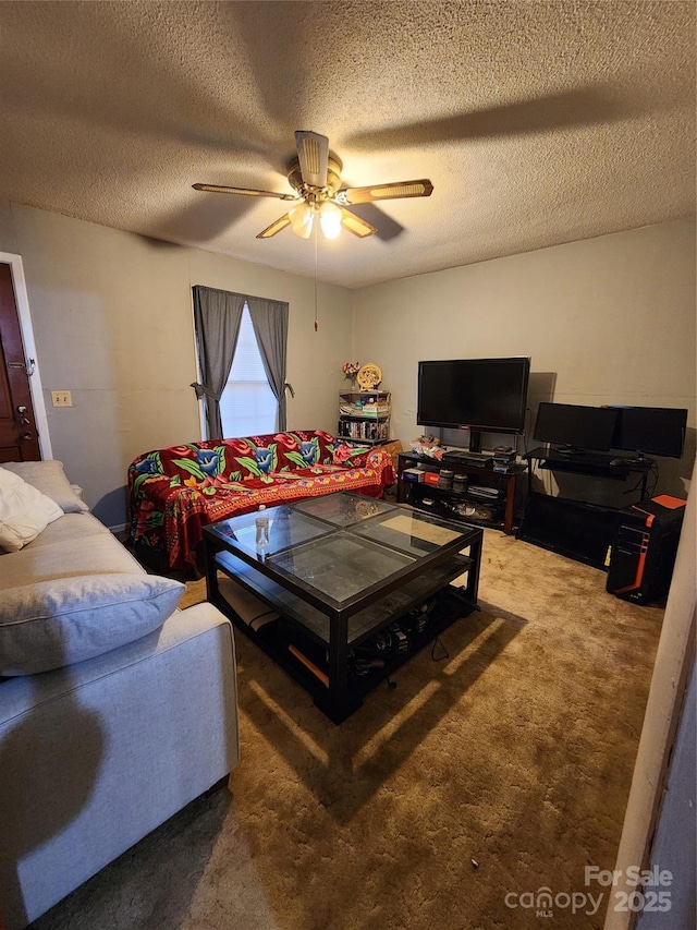 living room with a textured ceiling, carpet floors, and ceiling fan