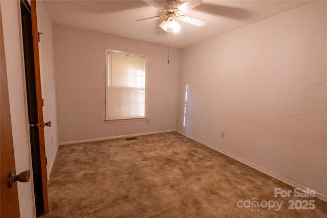 3581 Thompson St, Newton, NC 28658 - carpeted spare room featuring a ceiling fan and baseboards