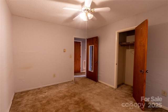 3581 Thompson St, Newton, NC 28658 - unfurnished bedroom featuring carpet, a closet, ceiling fan, and baseboards