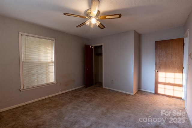 3581 Thompson St, Newton, NC 28658 - unfurnished bedroom with carpet, baseboards, and ceiling fan