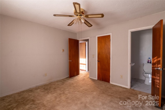 3581 Thompson St, Newton, NC 28658 - unfurnished bedroom featuring ensuite bathroom, carpet, a textured ceiling, ceiling fan, and baseboards