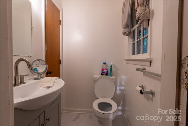 3581 Thompson St, Newton, NC 28658 - bathroom with baseboards, vanity, toilet, and marble finish floors