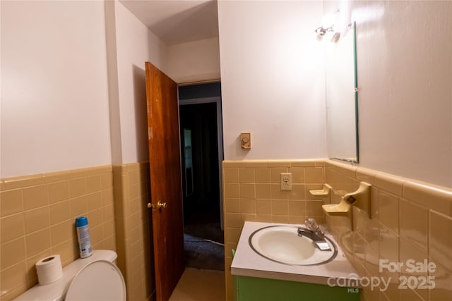 3581 Thompson St, Newton, NC 28658 - bathroom with tile walls, vanity, a wainscoted wall, and toilet