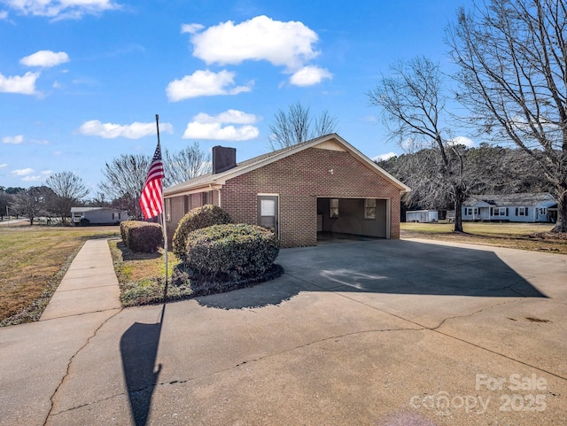 view of side of property featuring a carport