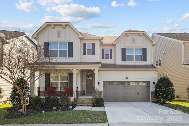 view of front of home featuring a garage and covered porch