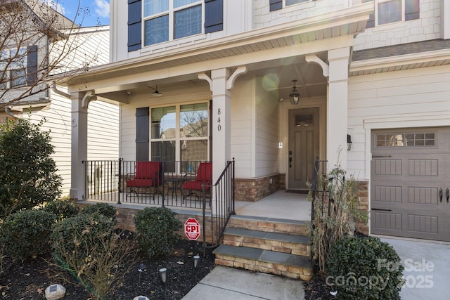 entrance to property featuring covered porch