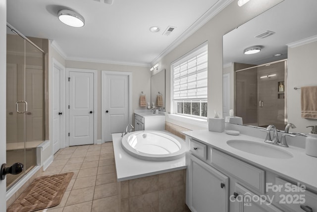 bathroom featuring vanity, tile patterned flooring, crown molding, and separate shower and tub