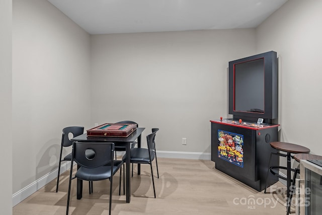 dining area with light hardwood / wood-style floors