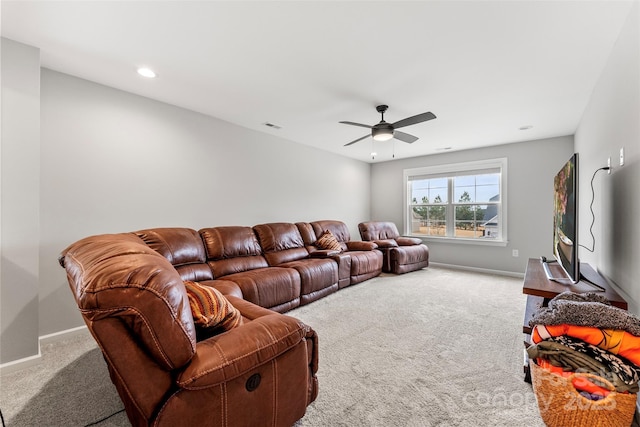 carpeted living room featuring a ceiling fan, recessed lighting, visible vents, and baseboards