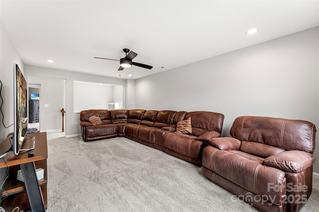 living area with recessed lighting, baseboards, ceiling fan, and light colored carpet