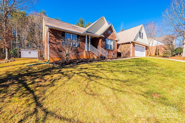 view of front of house with a garage and a front lawn