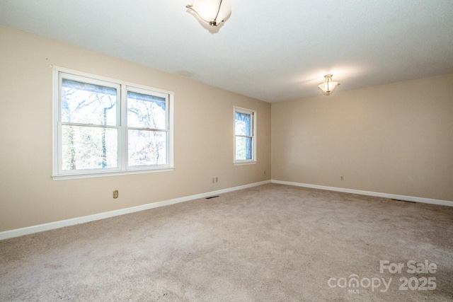 view of carpeted spare room