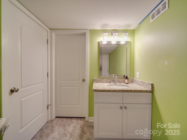 bathroom featuring vanity