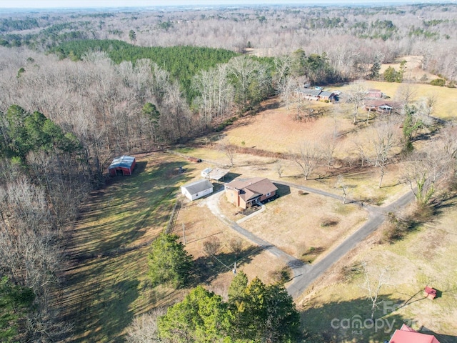 birds eye view of property featuring a rural view