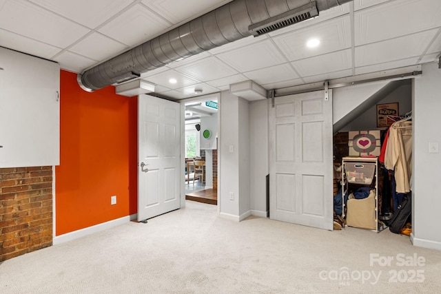 basement featuring carpet flooring