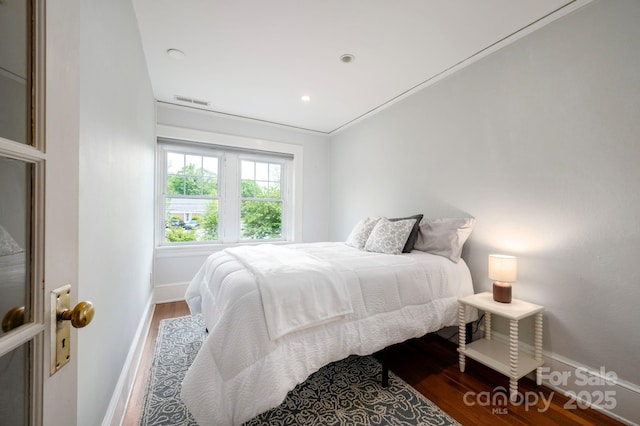 5 Chiles Ave, Asheville, NC 28803 - bedroom with wood finished floors, baseboards, and recessed lighting