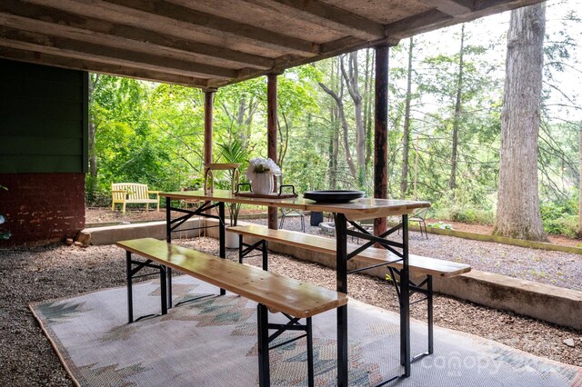 5 Chiles Ave, Asheville, NC 28803 - view of patio featuring a view of trees