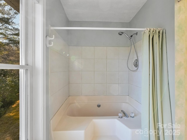 bathroom featuring a textured ceiling