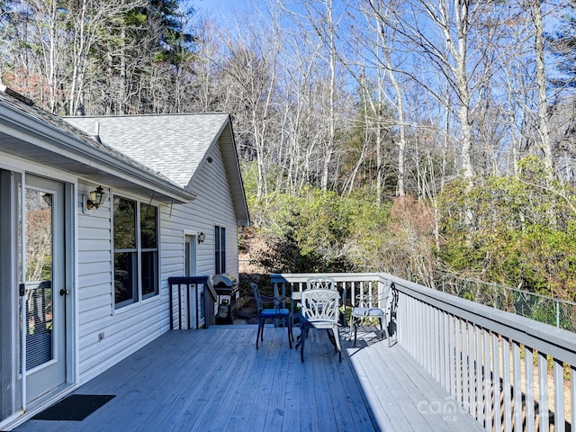 wooden deck with area for grilling