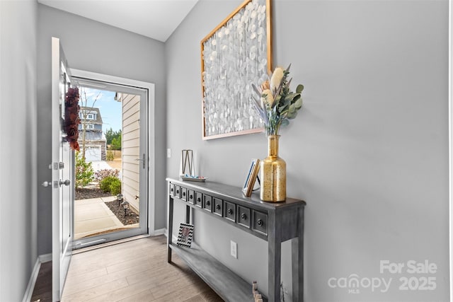 doorway to outside featuring hardwood / wood-style floors