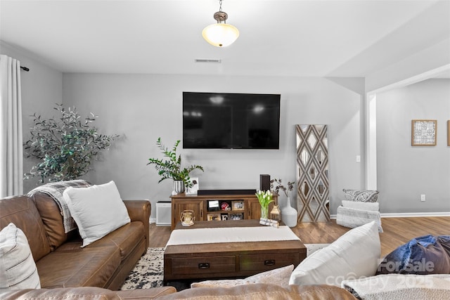 living room with hardwood / wood-style floors