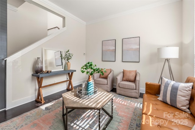 living room featuring dark hardwood / wood-style flooring and ornamental molding