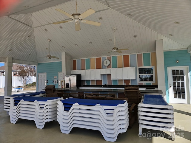 view of patio / terrace featuring ceiling fan and a sink