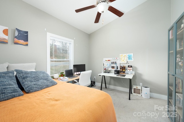 carpeted bedroom featuring ceiling fan and lofted ceiling