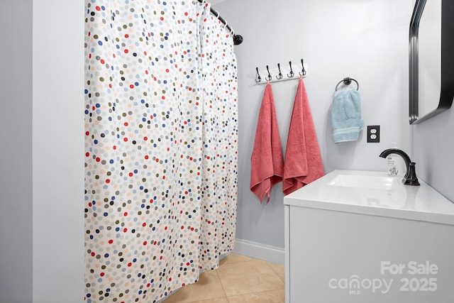 bathroom with vanity and tile patterned floors