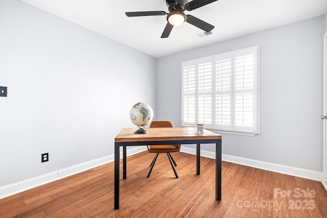 office space with ceiling fan and light wood-type flooring