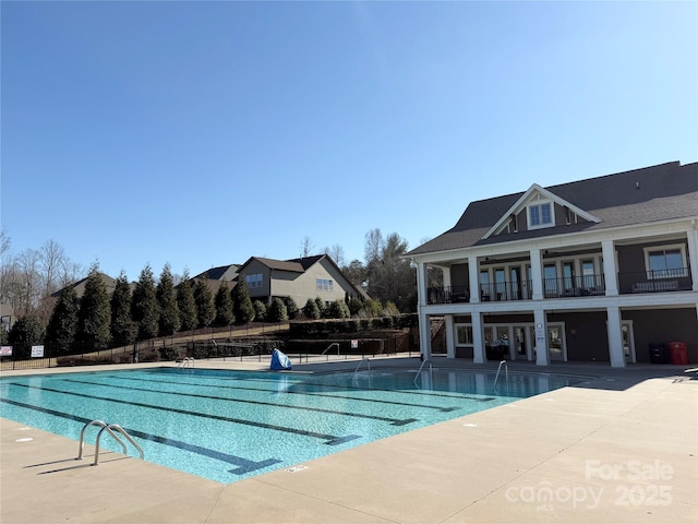 view of pool featuring a patio