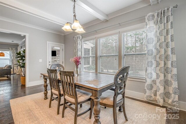 2201 Bluebell Way, Tega Cay, SC 29708 - dining space with a chandelier, dark wood finished floors, baseboards, beam ceiling, and ornamental molding