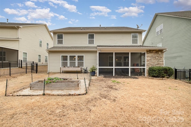 2201 Bluebell Way, Tega Cay, SC 29708 - rear view of house featuring a garden, a sunroom, and a fenced backyard