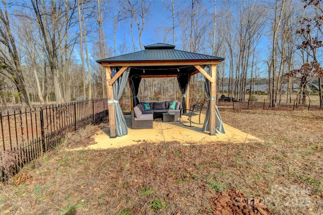 view of yard with a gazebo, outdoor lounge area, and a patio