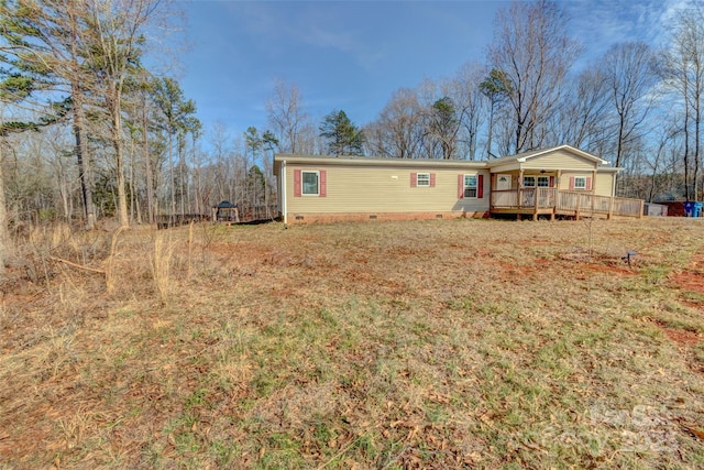 rear view of property with a porch