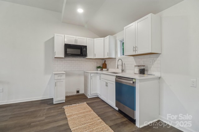 211 Brooklyn Ave, Lancaster, SC 29720 - kitchen featuring black microwave, dishwasher, a sink, lofted ceiling, and decorative backsplash