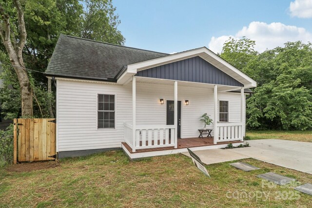 211 Brooklyn Ave, Lancaster, SC 29720 - view of front of property with a shingled roof and a porch