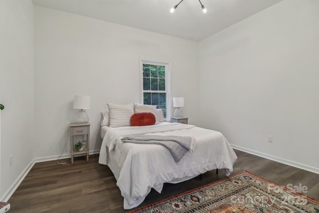 211 Brooklyn Ave, Lancaster, SC 29720 - bedroom featuring dark wood finished floors and baseboards
