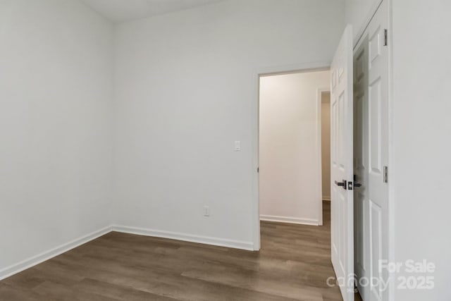 211 Brooklyn Ave, Lancaster, SC 29720 - spare room with dark wood-type flooring and baseboards