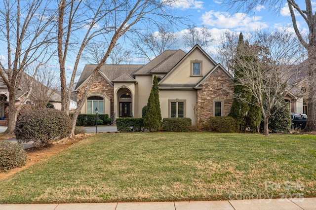 view of front of home with a front lawn