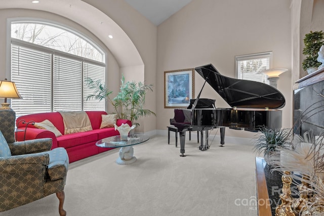 sitting room featuring carpet floors and plenty of natural light