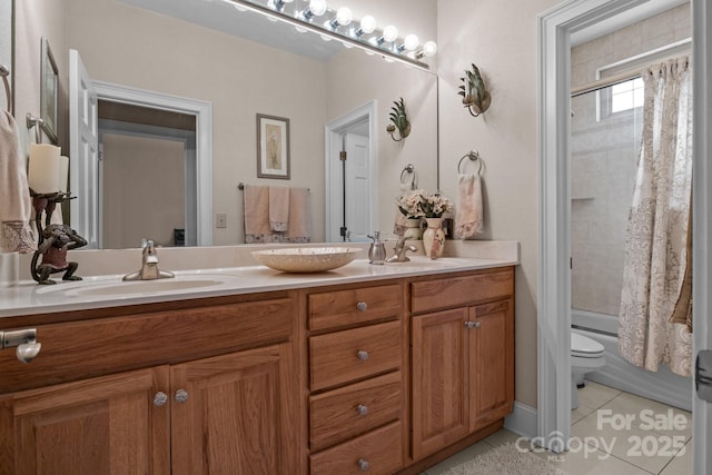 full bathroom featuring tile patterned flooring, vanity, shower / tub combo, and toilet