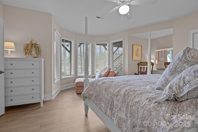 bedroom featuring ceiling fan and light hardwood / wood-style flooring