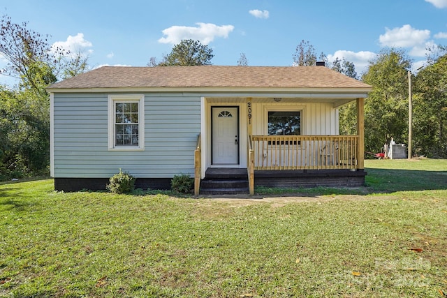 bungalow-style house featuring a porch and a front yard