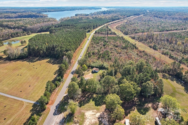 bird's eye view featuring a water view and a rural view