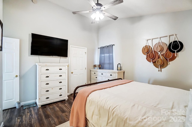 bedroom featuring dark wood-type flooring and ceiling fan