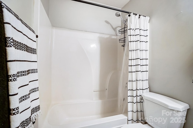 bathroom with shower / bathtub combination with curtain and toilet