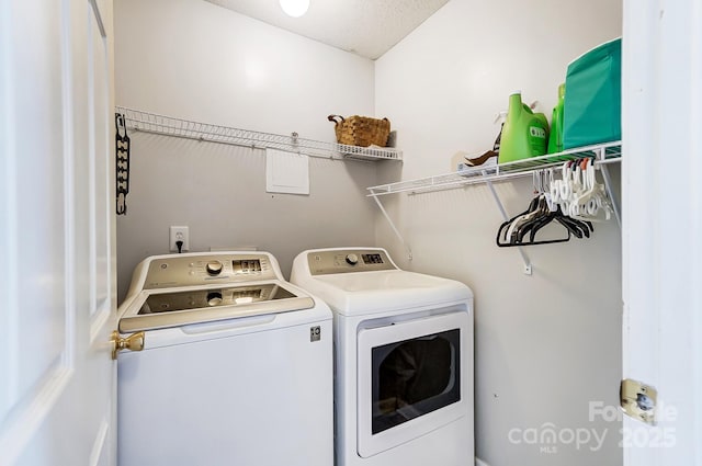 laundry area featuring washing machine and dryer