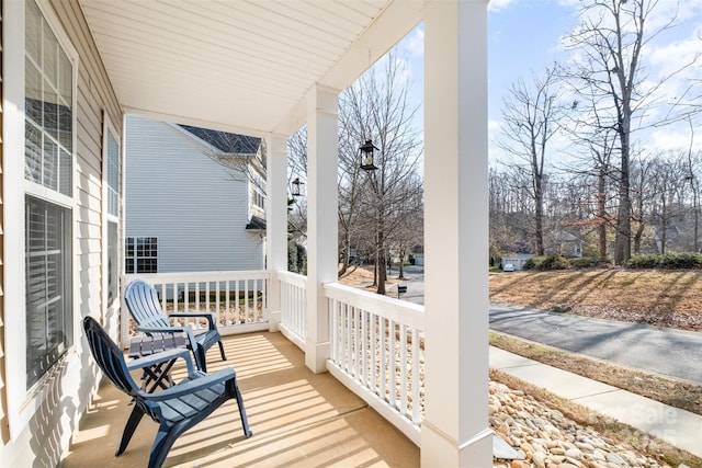 balcony featuring covered porch