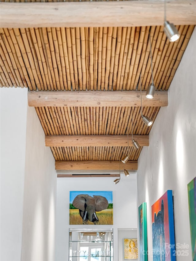 interior details featuring beamed ceiling